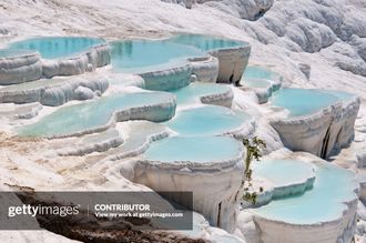 Turquoise pools in travertine terraces at Pamukkale